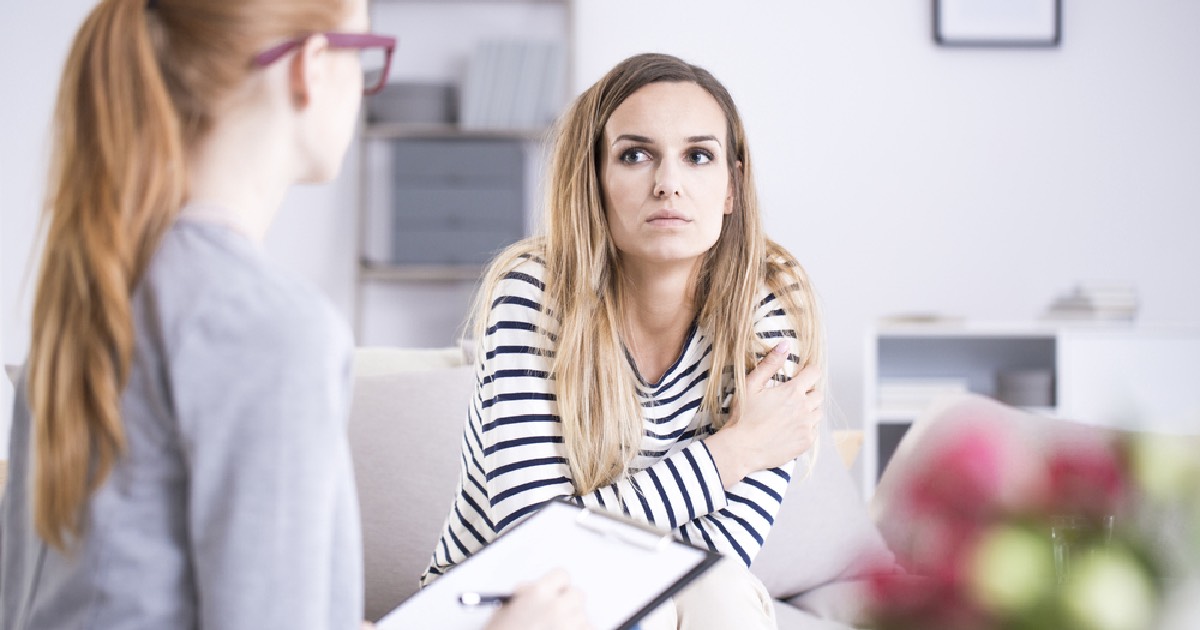 Woman talking to therapist in therapy session