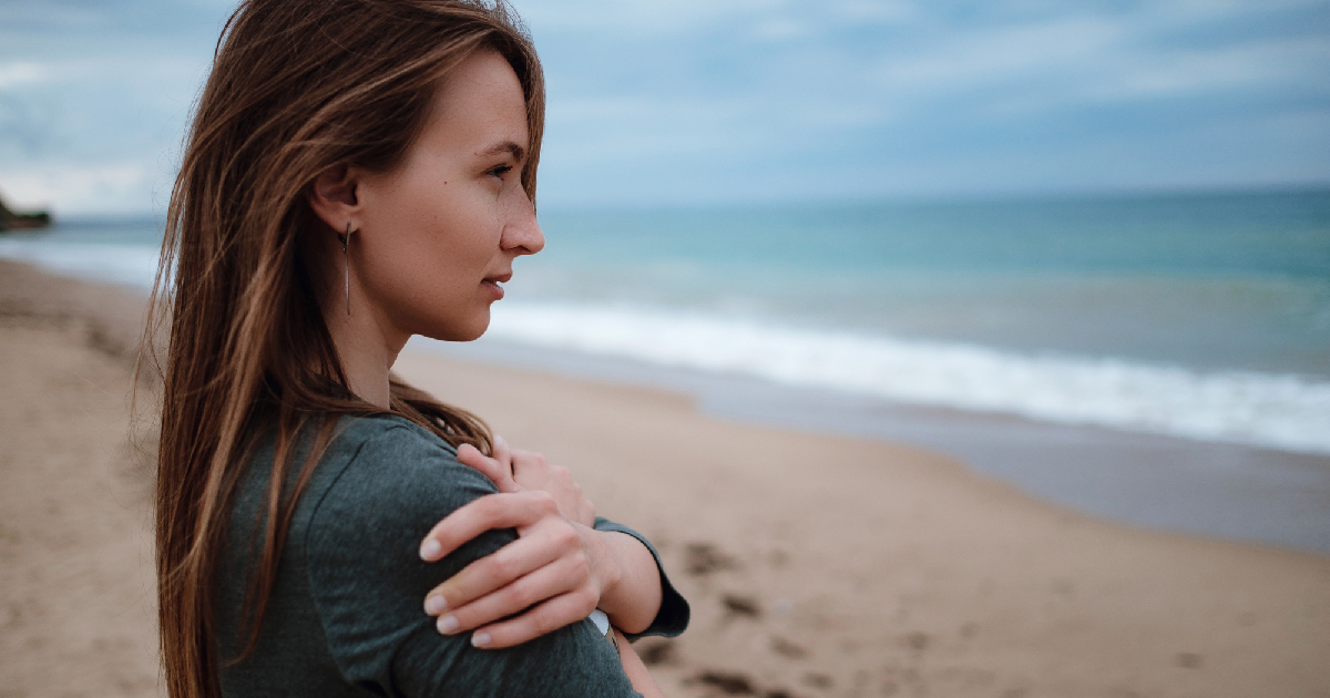 Woman standing near beach