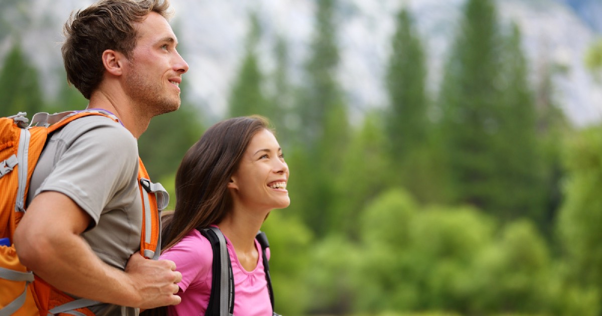 Couple outdoors looking at nature