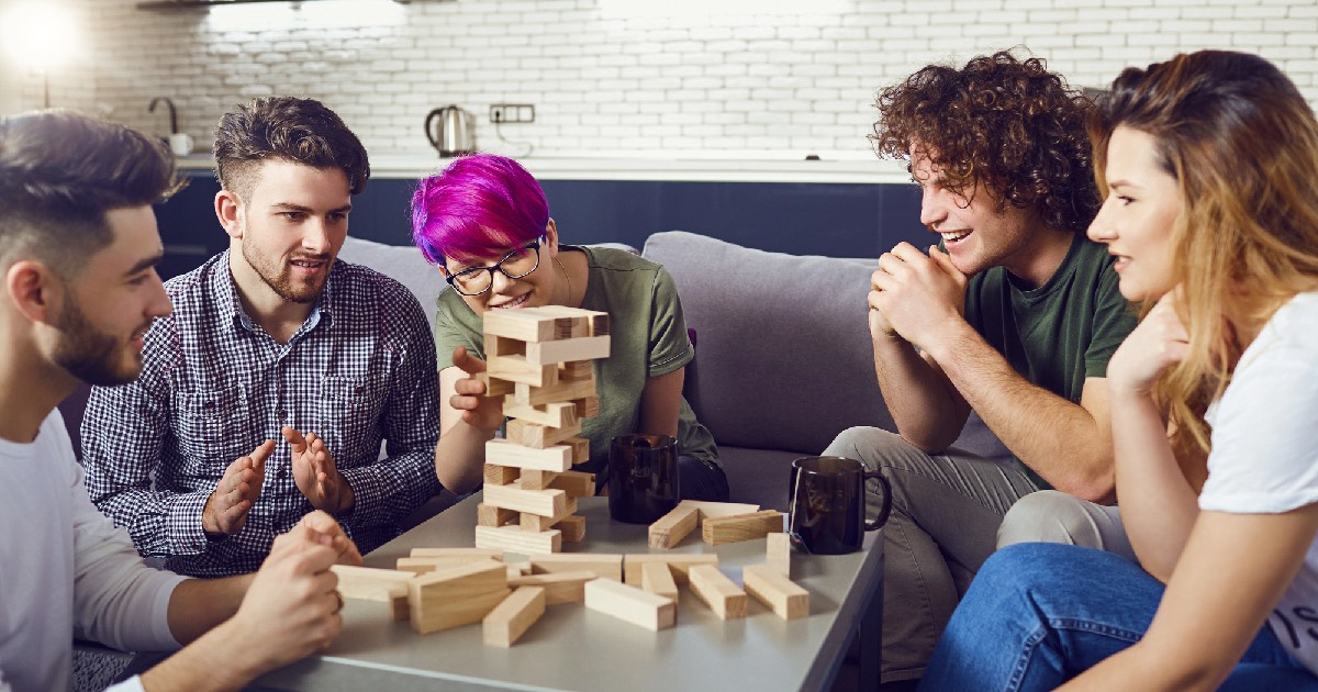 Group of friends playing Jenga